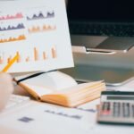 Business owner reviewing growth charts and performance reports