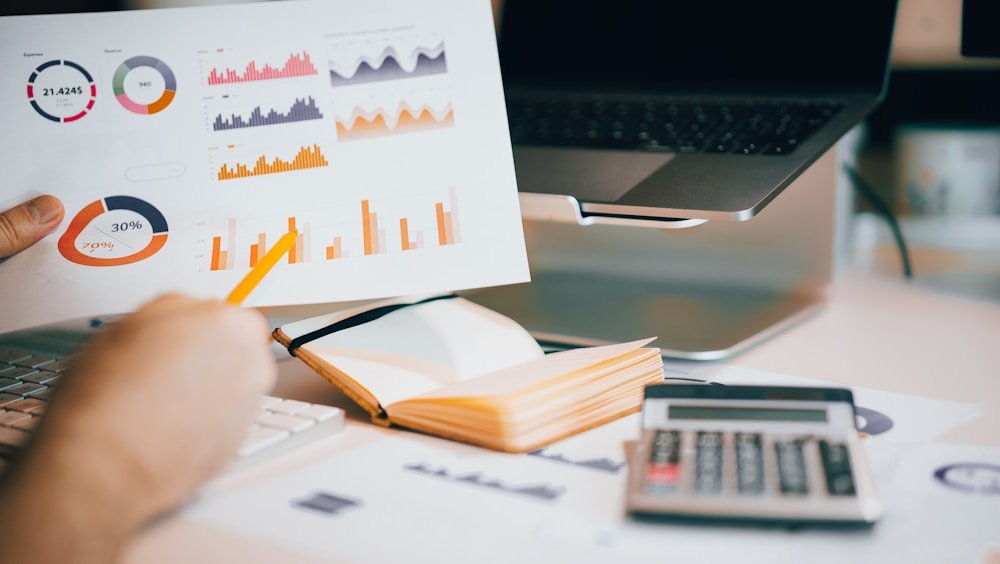 Business owner reviewing growth charts and performance reports